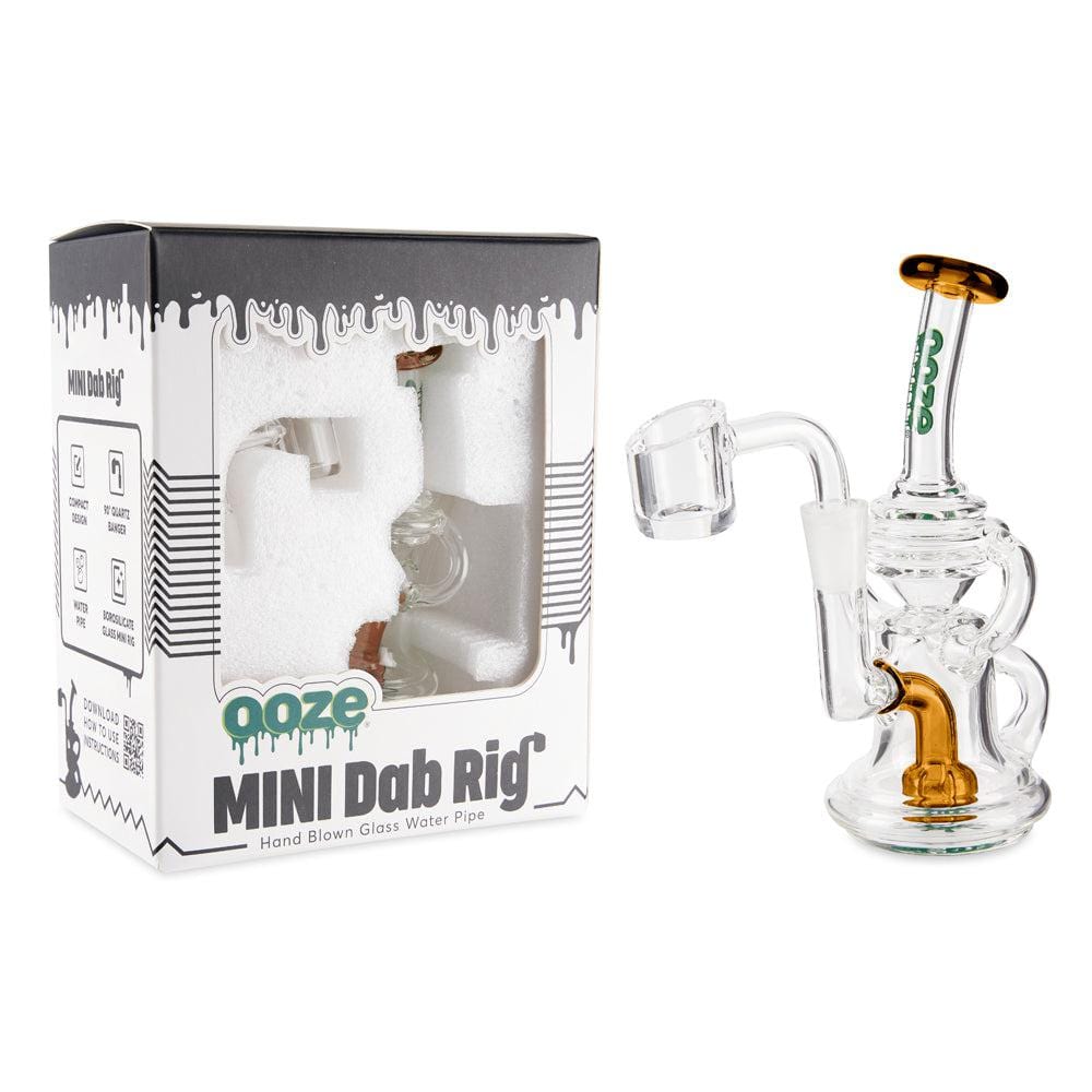 The Ooze Surge Mini Recycler Dab Rig is shown in a front-facing view with clear glass and a compact design.