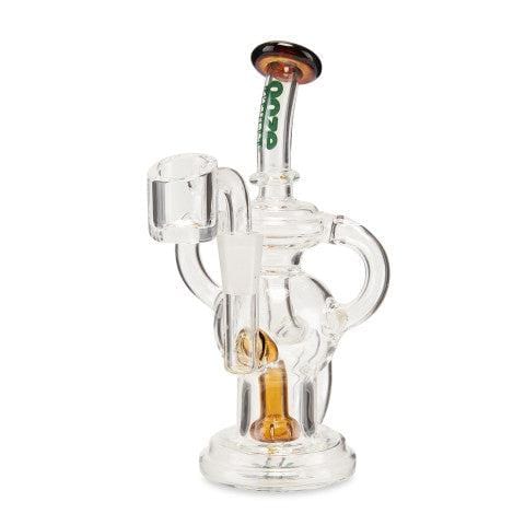 A three-quarter view of the Ooze Swell Mini Recycler Dab Rig, showcasing its clear glass construction and compact design.