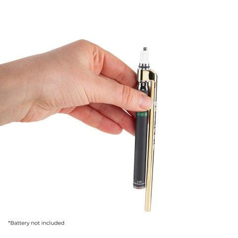 A hand holds the Ooze x Stache ConNectar - 510 Thread Dab Straw Vape Pen Attachment, showcasing its sleek, metallic design.