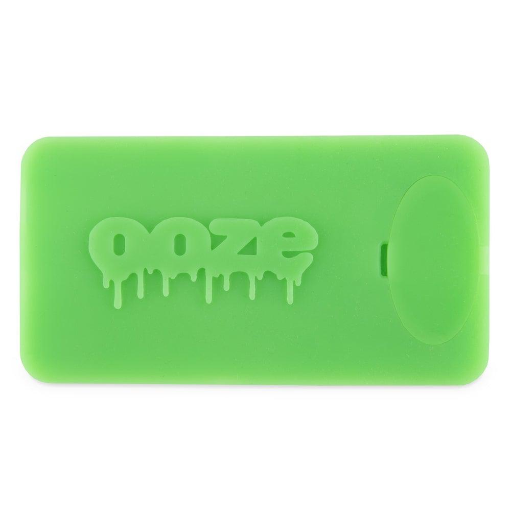 A studio shot of the Ooze Slugger Silicone Dugout, showing its rounded, compact shape on a white background.