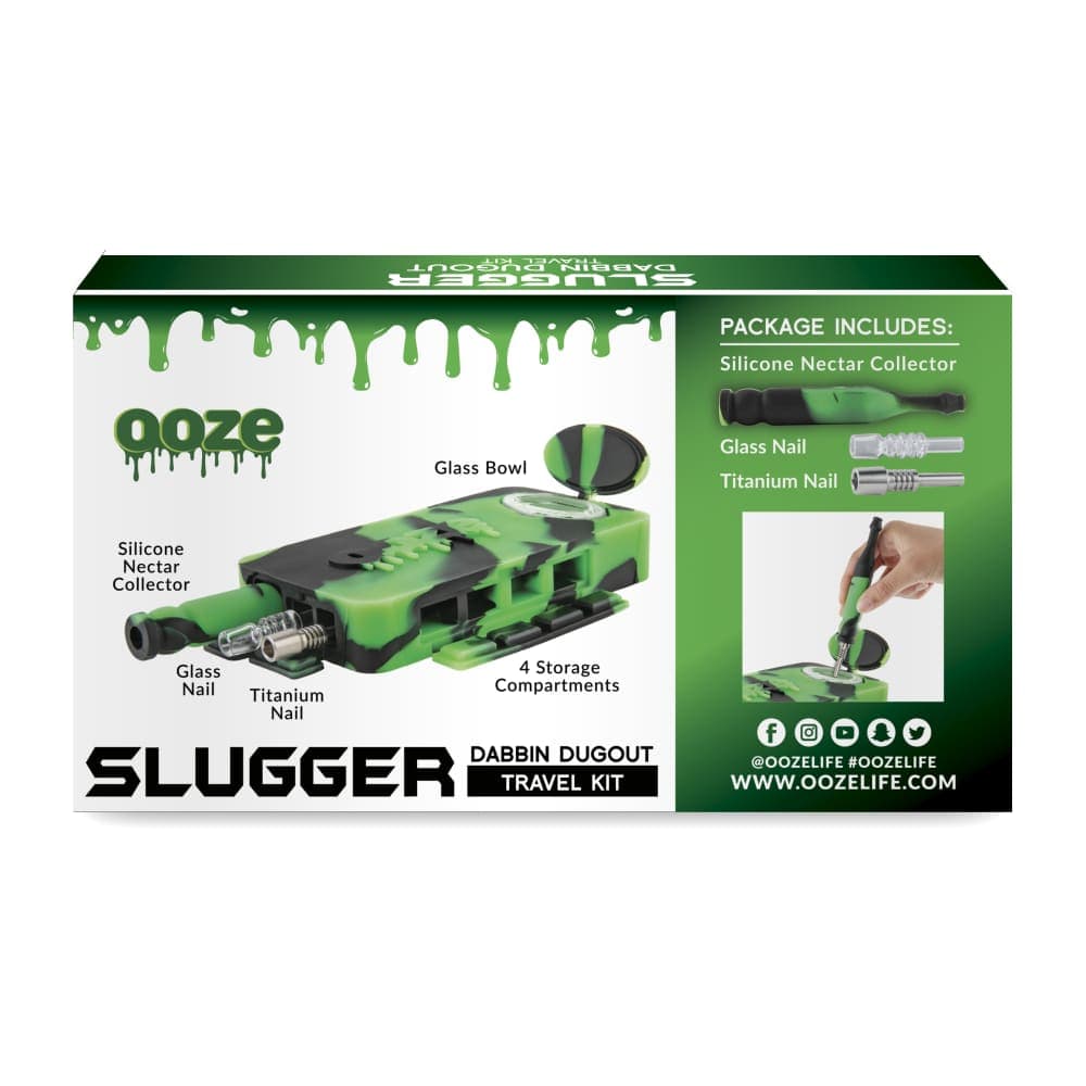 The Ooze Slugger Silicone Dugout is displayed next to its packaging, showcasing included components in a brightly lit studio shot.