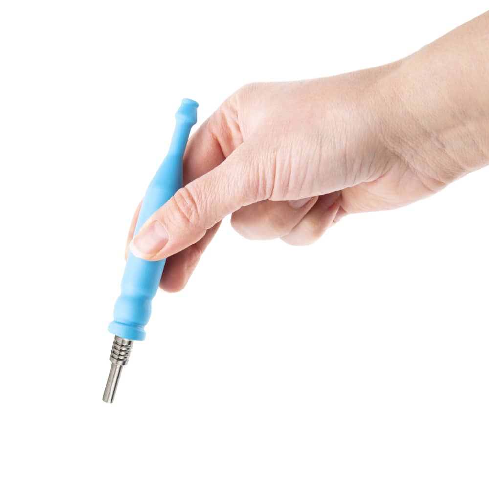 A hand holds the Ooze Slugger Silicone Dugout, highlighting its sleek, rounded form and textured grip.