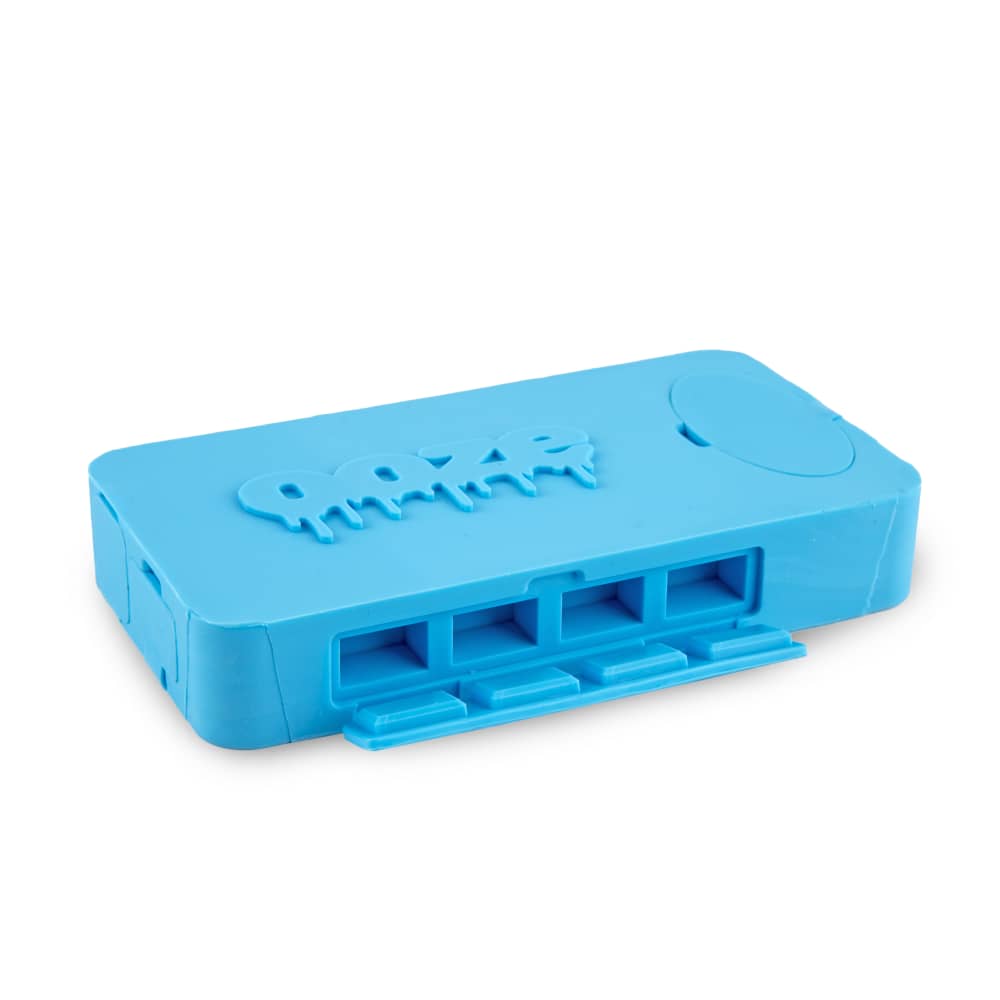 A close-up, angled view of the Ooze Slugger Silicone Dugout, showcasing its compact, blue design and smooth texture.