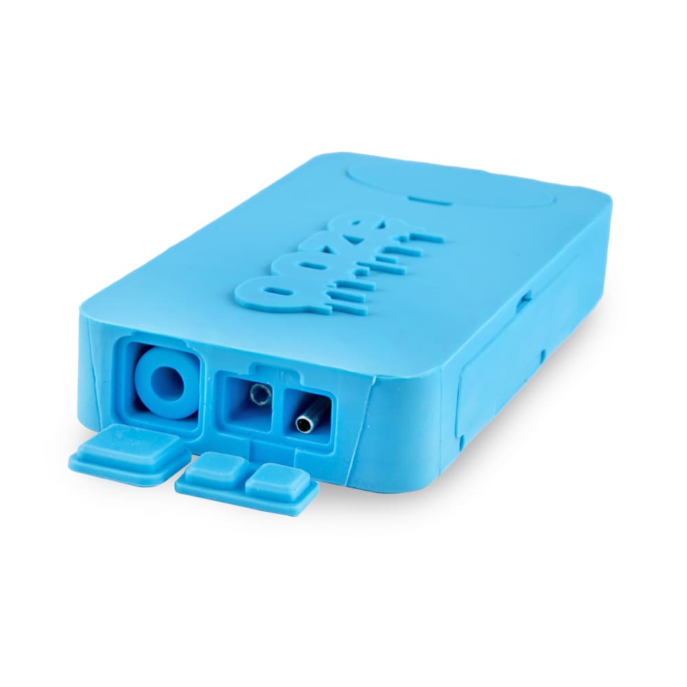 A close-up, angled view of the Ooze Slugger Silicone Dugout, revealing its blue, modular design and open compartments.