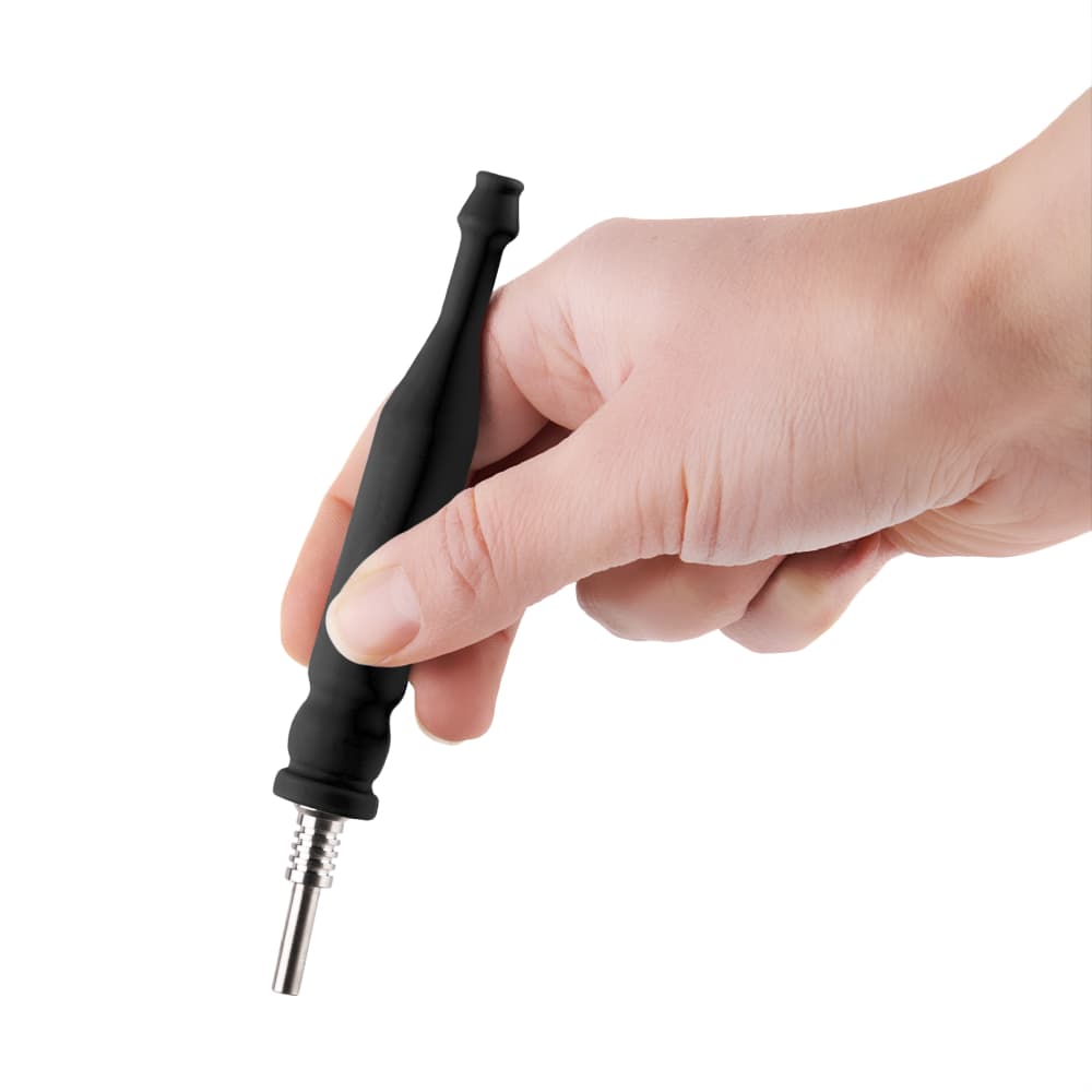 A close-up, angled view shows a hand holding the black Ooze Slugger Silicone Dugout, emphasizing its sleek, cylindrical shape.