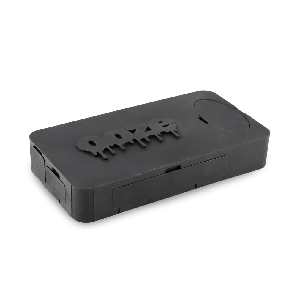 A close-up, angled view of the Ooze Slugger Silicone Dugout, showcasing its compact, dark gray design.