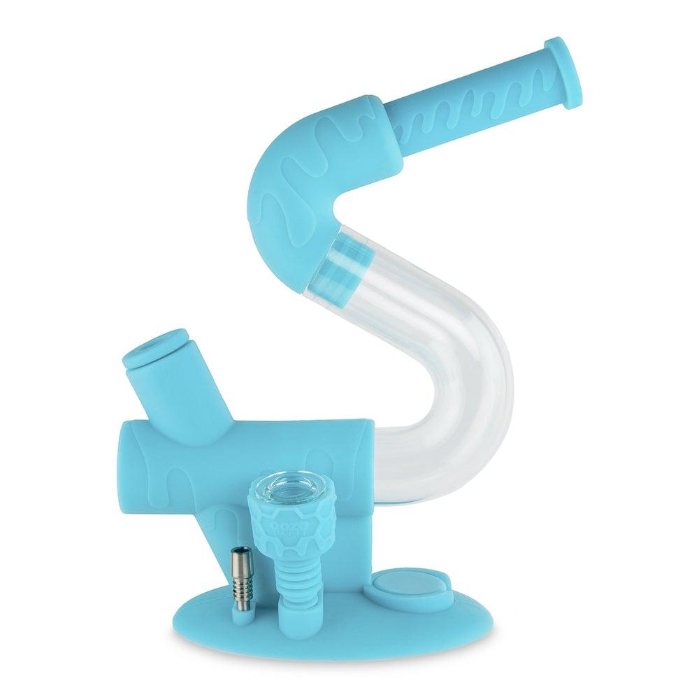 A front view of the Ooze Swerve Silicone Water Pipe, featuring a blue, curved design and clear glass downstem.