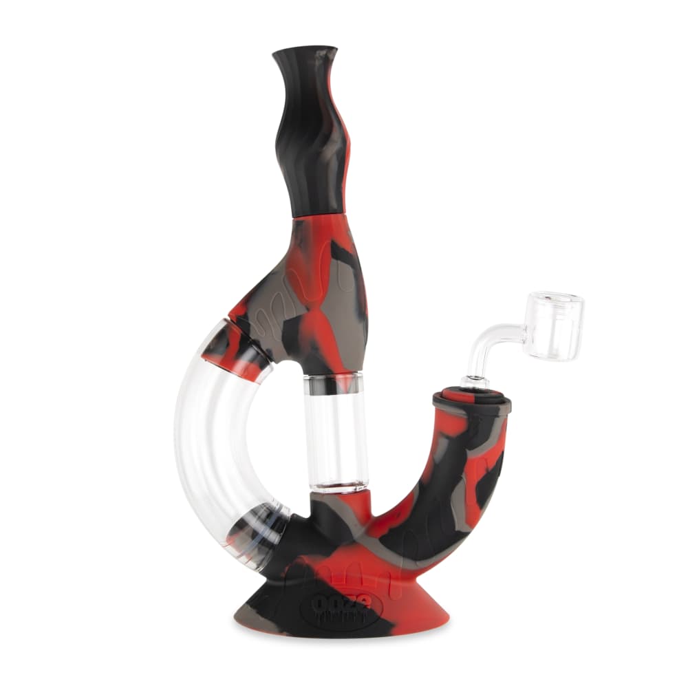A three-quarter view of the Ooze Echo Silicone Water Pipe, showcasing its curved design and clear glass accents.