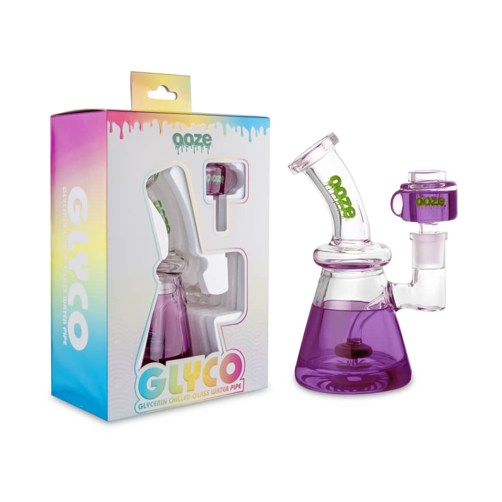 A studio shot displays the Ooze Glyco Bong, a glycerin chilled glass water pipe with a unique, colorful gradient fill.