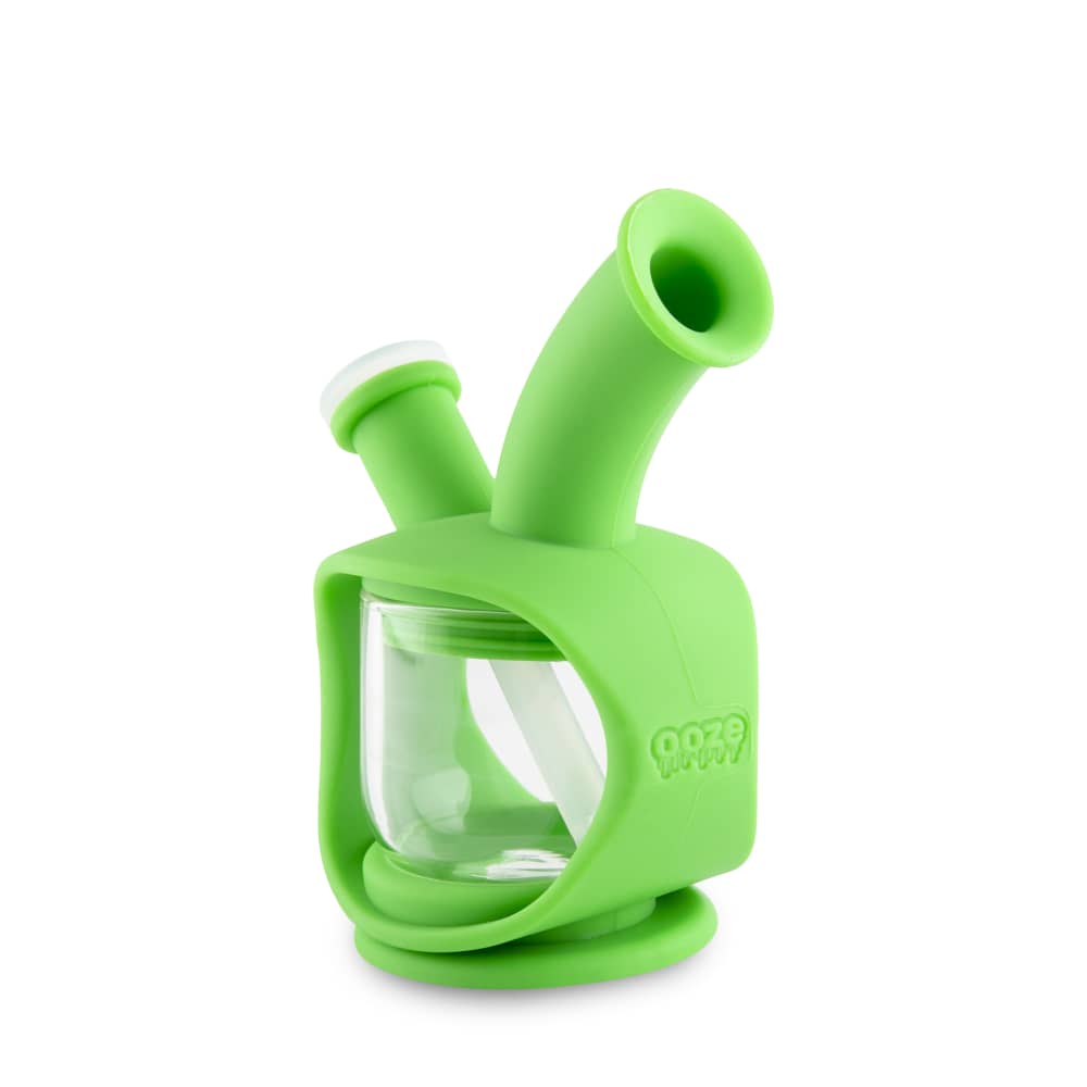 A three-quarter view of the Ooze Kettle Silicone Bubbler, showcasing its rounded shape and translucent green hue.