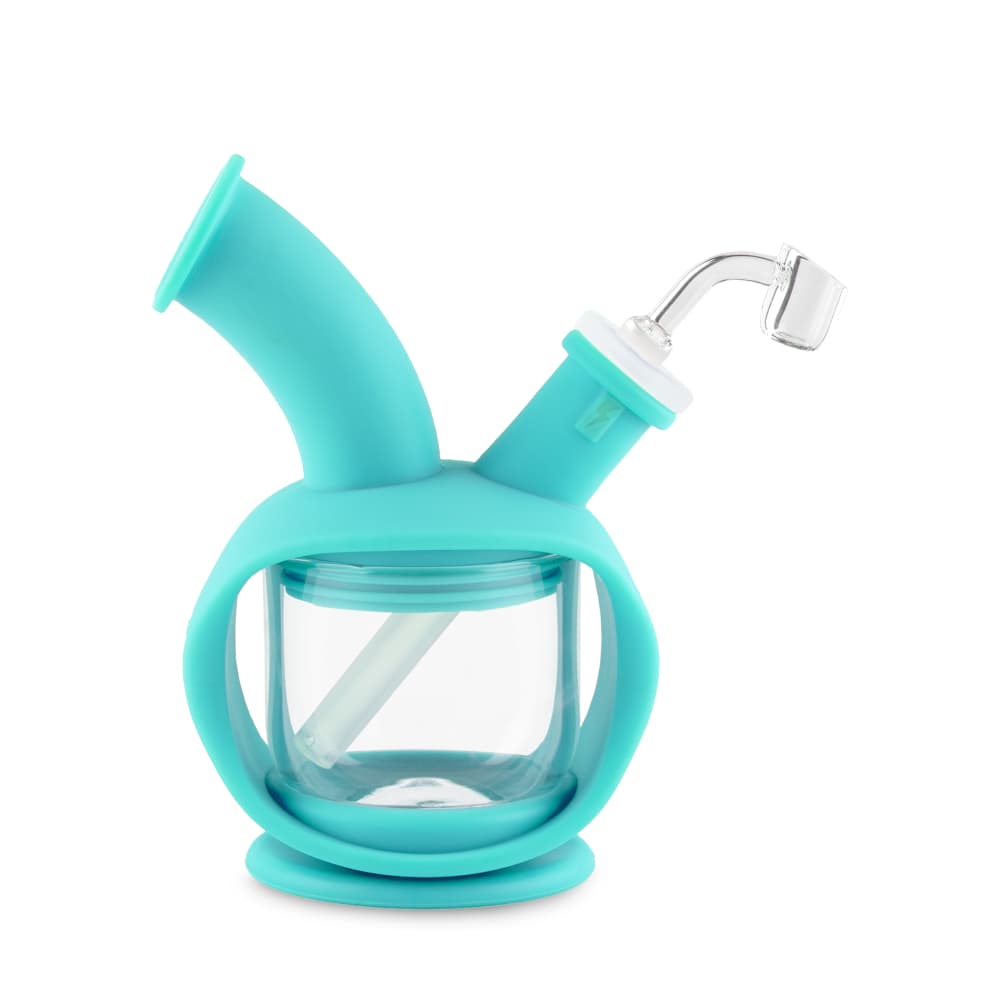 A front view of the Ooze Kettle Silicone Bubbler, showcasing its clear glass chamber within a teal silicone frame.