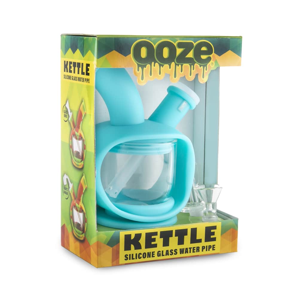 Front view of the Ooze Kettle Silicone Bubbler, showcasing its compact size and clear glass construction against a dark background.