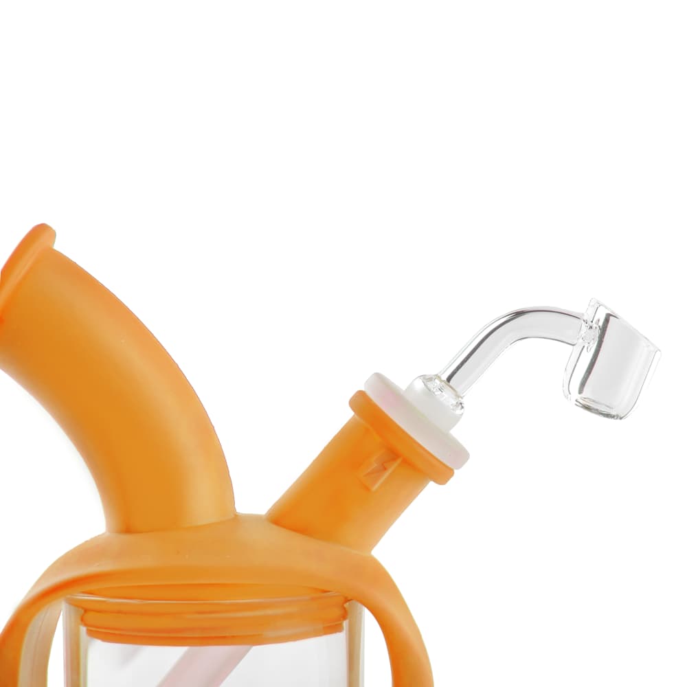 A slightly angled view of the Ooze Kettle Silicone Bubbler, showing the clear glass joint against a light-colored silicone body.