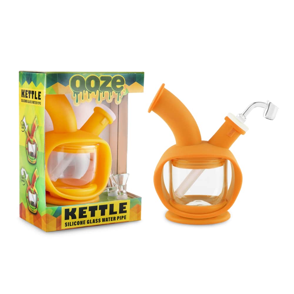 A front view of the Ooze Kettle Silicone Bubbler, showcasing the orange, compact design against a white background.