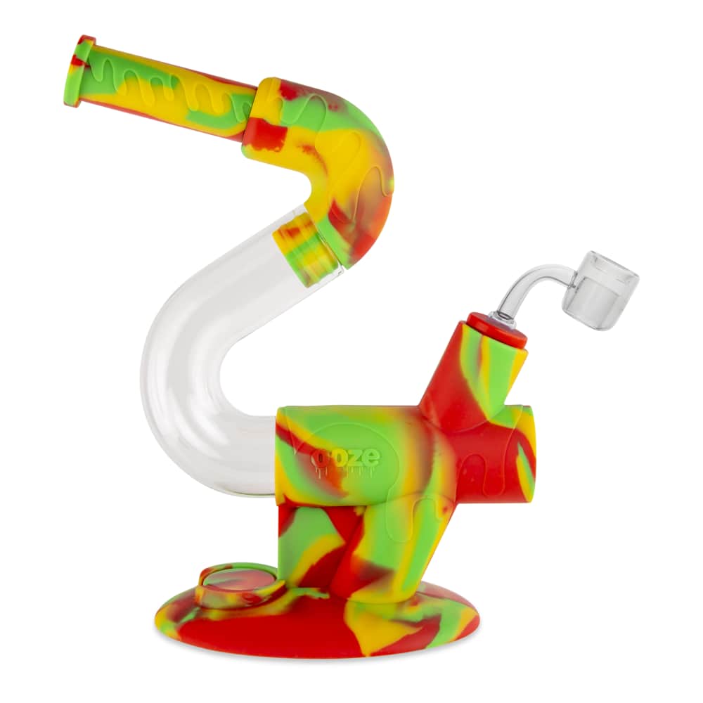A three-quarter view of the Ooze Swerve Silicone Water Pipe, featuring a colorful, curved design and clear glass downstem.