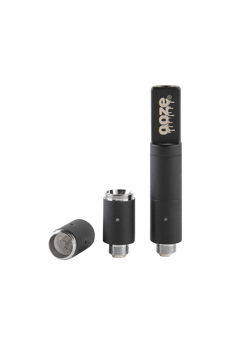 A close-up, angled view of the Ooze Slim Twist Pro Wax Atomizer Tank, displaying its metallic silver components on a black surface.