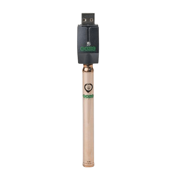 A slightly angled close-up of the Ooze Slim Twist Battery with Charger, showing its metallic finish and compact design.
