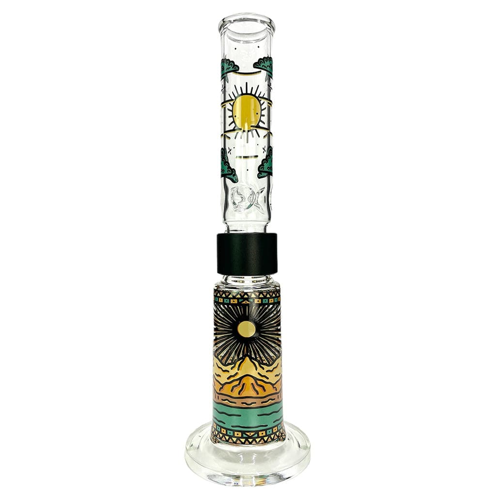 Vertical front view of a Prism Desert Dream'N Big Honeycomb Single Stack glass piece with sun and mountain desert artwork on a white background
