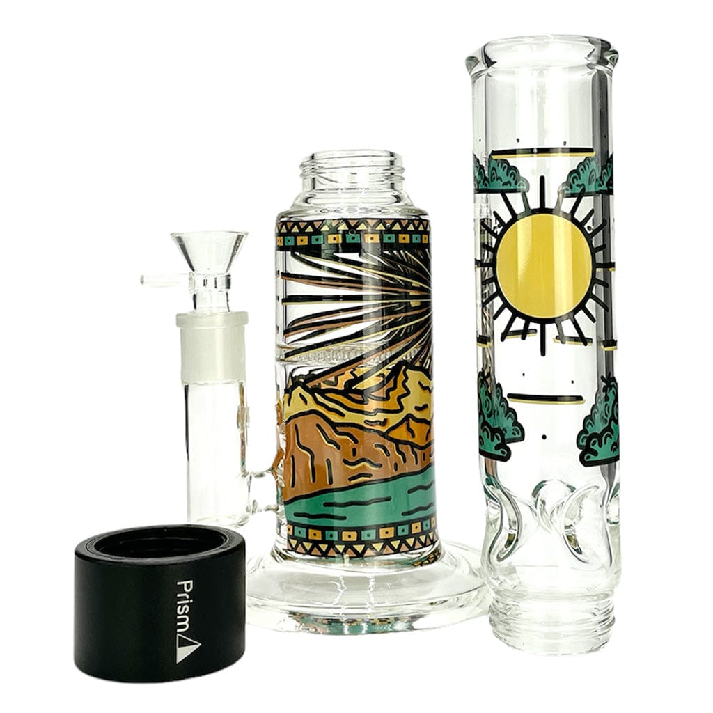Front view of the Prism Desert Dream'N Big Honeycomb Single Stack showing two decorated glass chambers with a sun and desert motif and a black Prism-branded base.