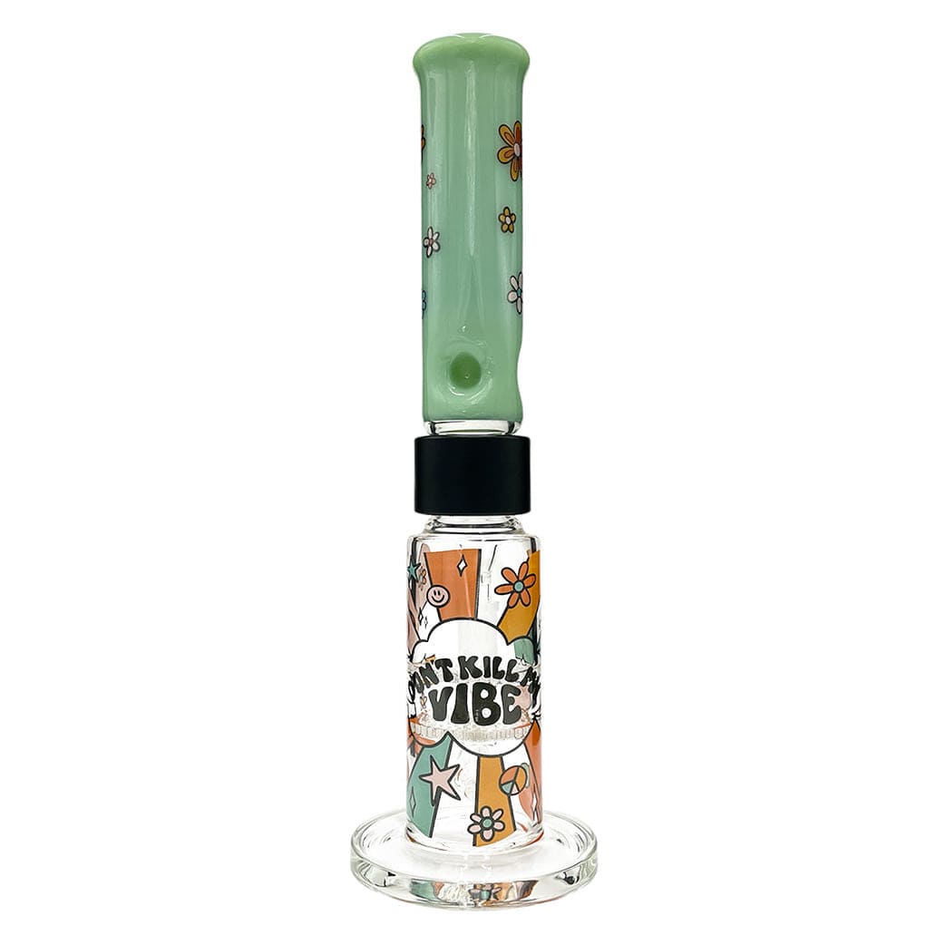 Front view of the Prism Flower Power Big Honeycomb Single Stack showing a tall clear base with colorful retro flower graphics and a green floral-patterned mouthpiece.