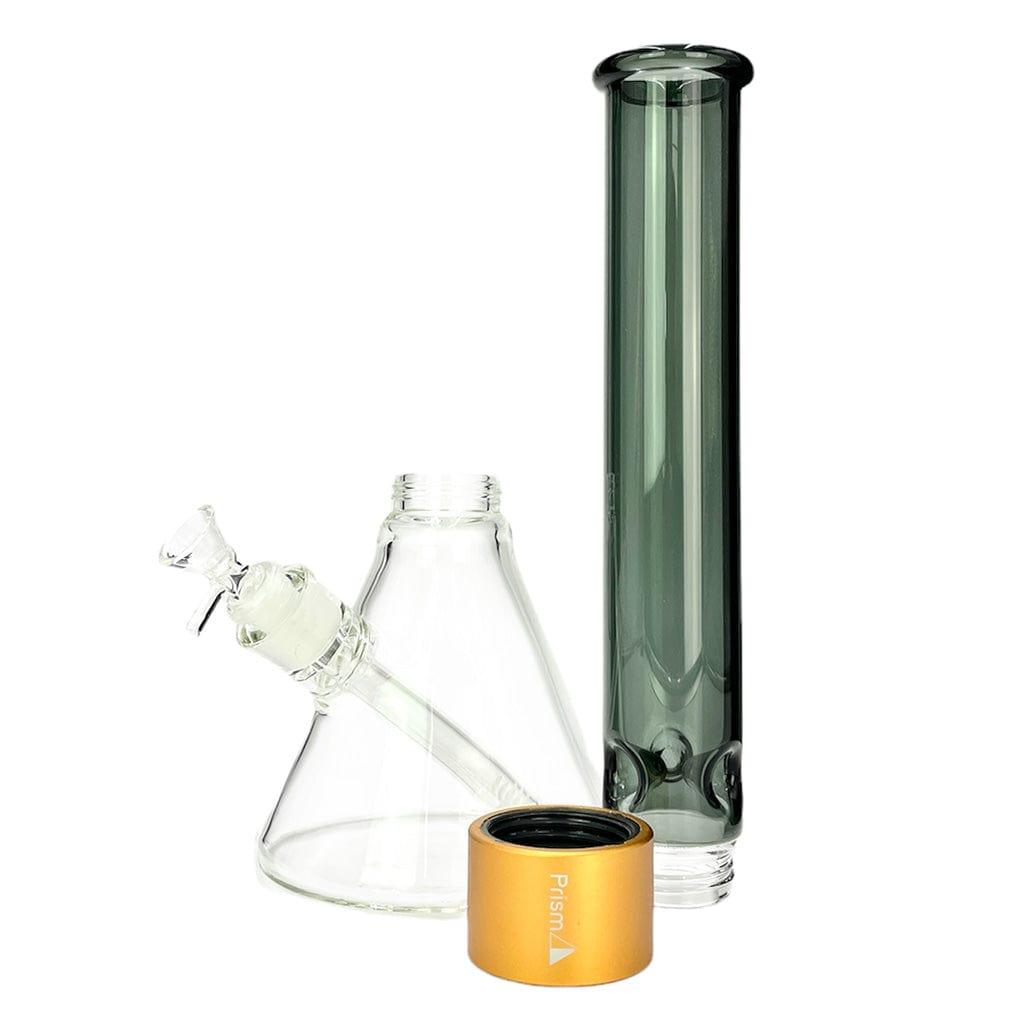 Three-piece studio shot of the Prism Halo Tall Beaker Single Stack showing a clear conical beaker base, a tall smoke-green straight tube, and a gold metal stack cap in front.