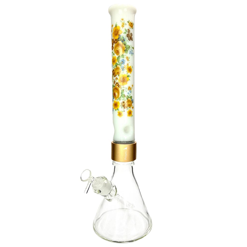 Straight-on view of the Prism Halo Vintage Floral Beaker Single Stack showing a tall white floral-decorated tube with yellow flowers atop a clear glass beaker base.