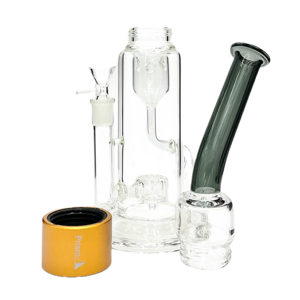 Front three-quarter view of the Prism Klein Incycler Single Stack showing its clear glass chamber, angled dark mouthpiece, and gold-colored base cap on a white background.