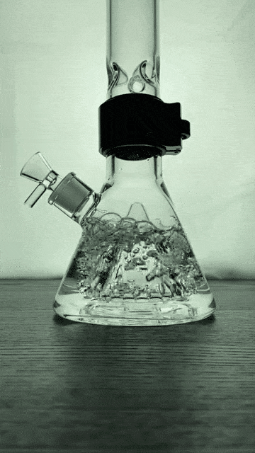 Close-up front view of the Prism Percolated Beaker Double Stack showing bubbling water in the clear beaker on a wood surface.