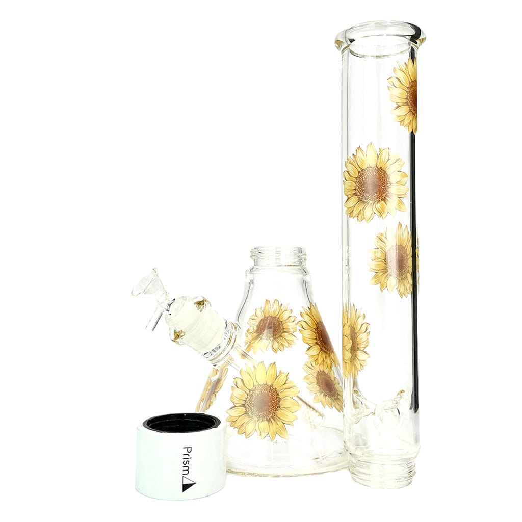 Three-quarter front view of the Prism Sunflower Beaker Single Stack showing clear glass beaker and tall tube decorated with yellow sunflower decals on a white background