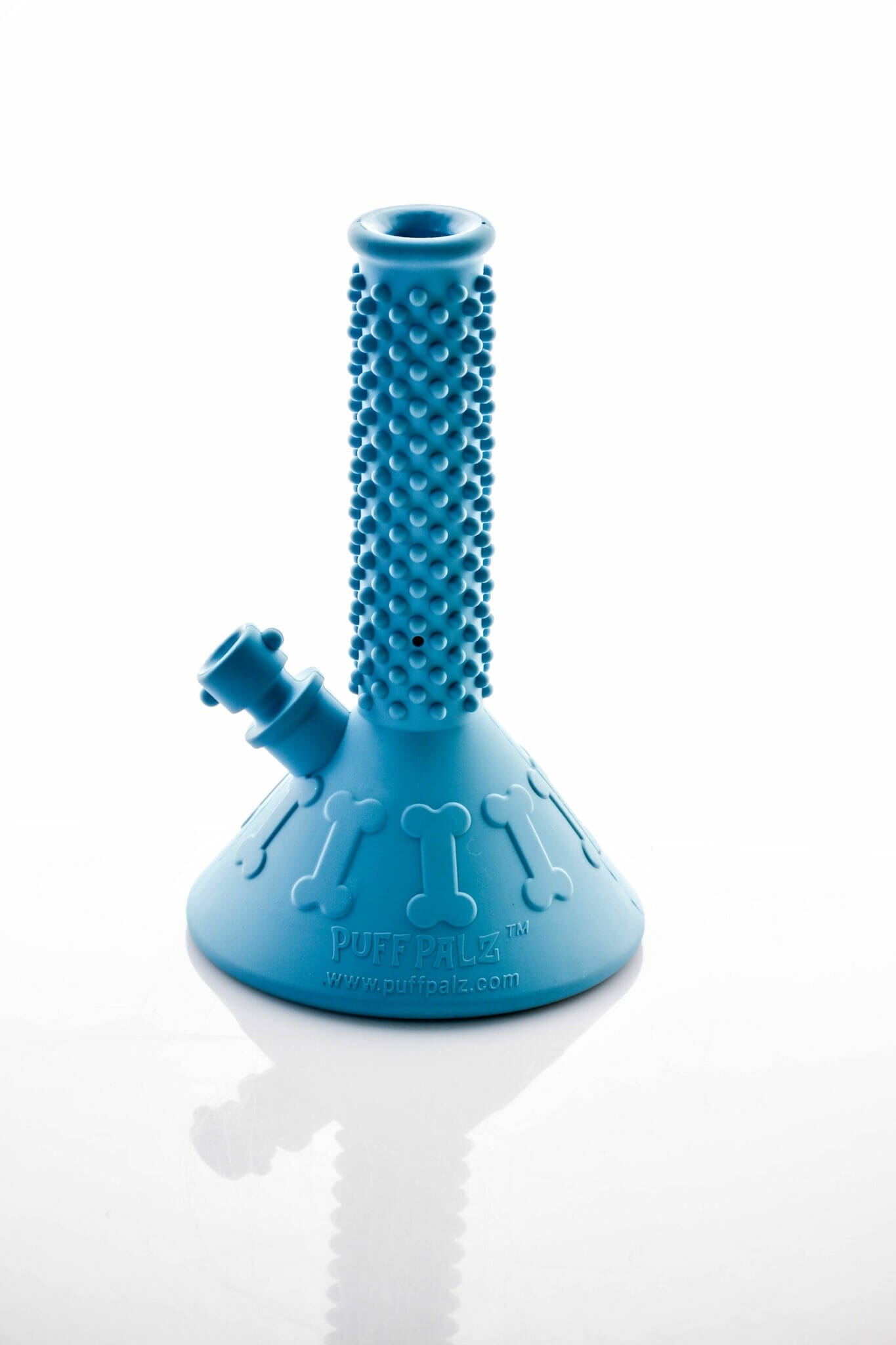 Front view of the Beaker Buddy, a blue, textured glass piece reflecting on a glossy surface.