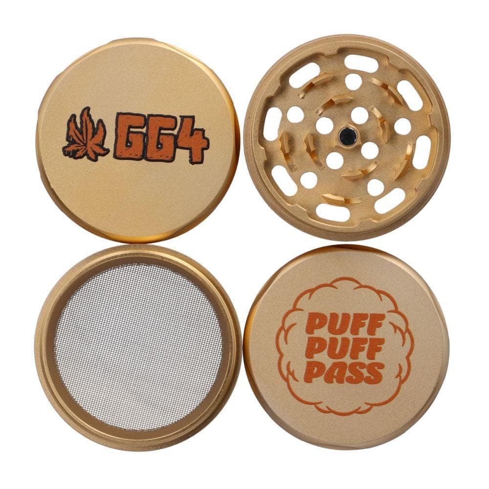 Top-down view of the gold Puff Puff Pass GG4 55mm 3-Stage Grinder showing its four separated pieces, printed logos, and fine metal screen.