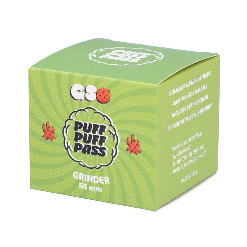 Three-quarter view of the green Puff Puff Pass GSC 55mm 3-Stage Grinder box showing front and right panels with white text and small red leaf graphics