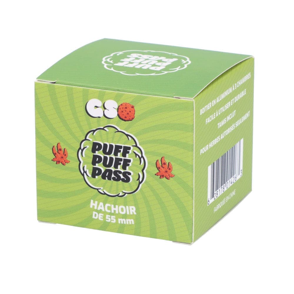 Three-quarter view of a green Puff Puff Pass GSC 55mm 3-Stage Grinder box with spiral pattern, logo and barcode visible.