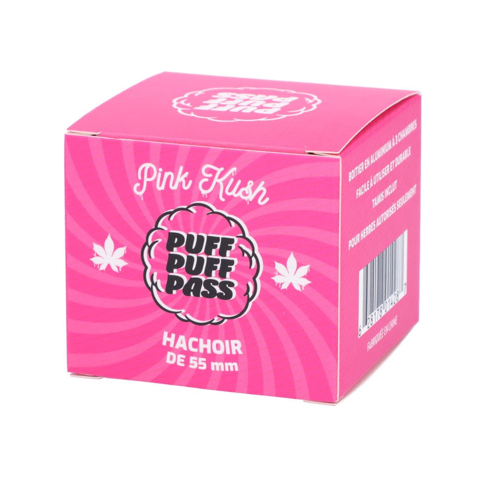 Three-quarter view of the bright pink Puff Puff Pass Pink Kush 55mm 3-Stage Grinder box with bold logo and white leaf motifs.