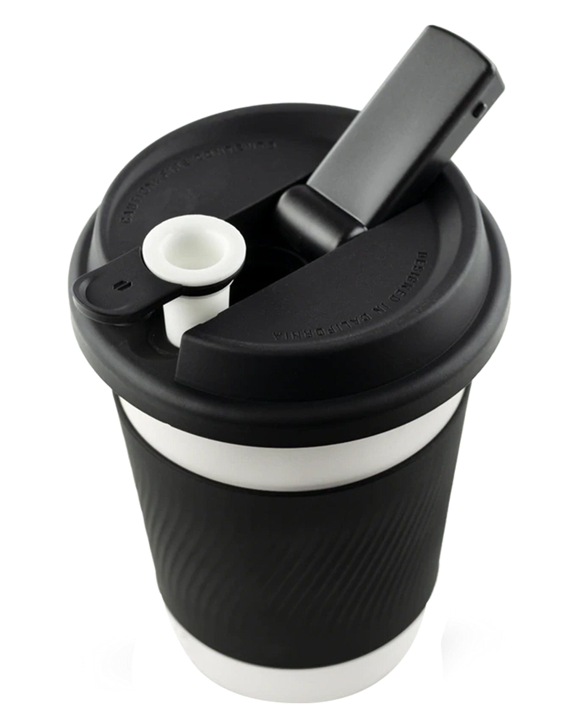 A close-up, angled view of the Cupsy, showing its textured black exterior and minimalist design.