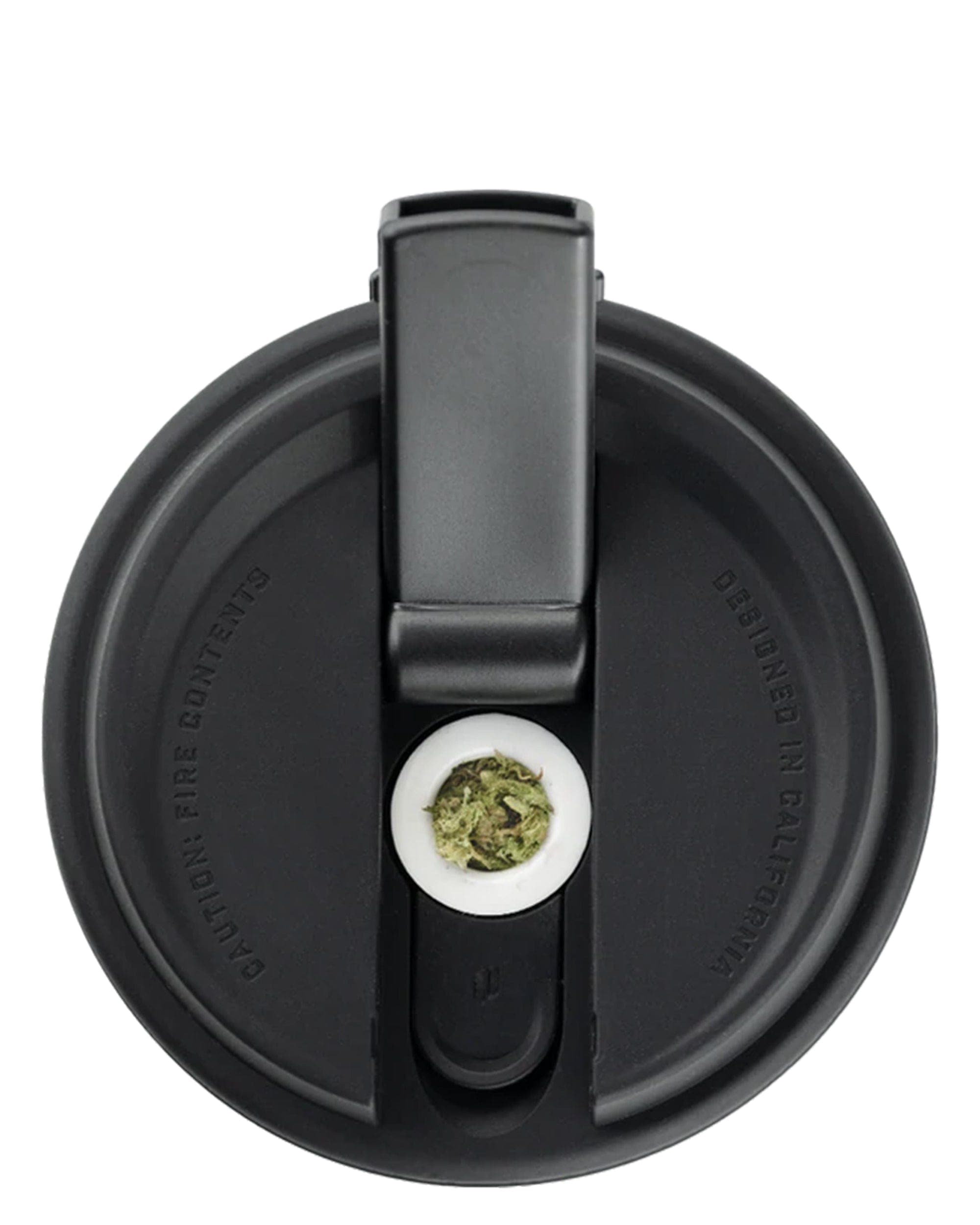 Close-up view of the Cupsy, showing a circular gray surface with text around the edge.