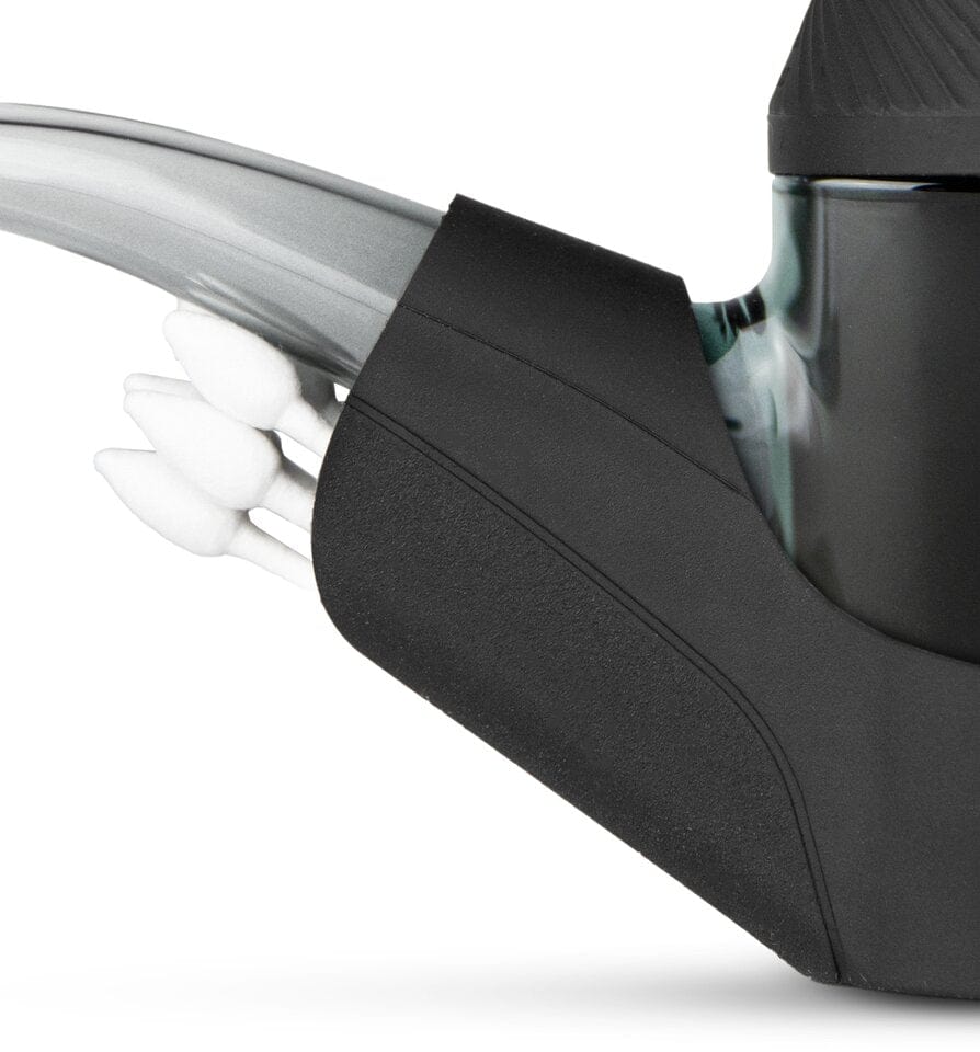 Close-up angled view of the Proxy Travel Pack, showcasing its sleek, dark form against a plain white background.