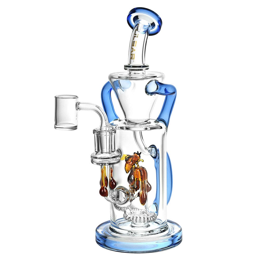 A three-quarter view of the Pulsar Honey Sweetness Recycler Dab Rig, showing its colorful glass design and joint angle.