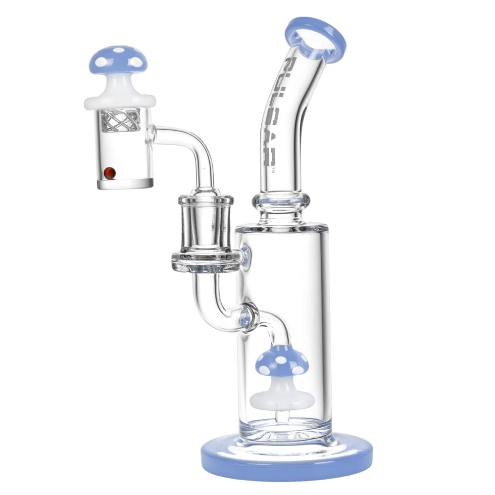 A three-quarter view of the Pulsar Shroom Rig Set w/ Carb Cap, featuring a colorful, rounded glass water pipe with a wide base.