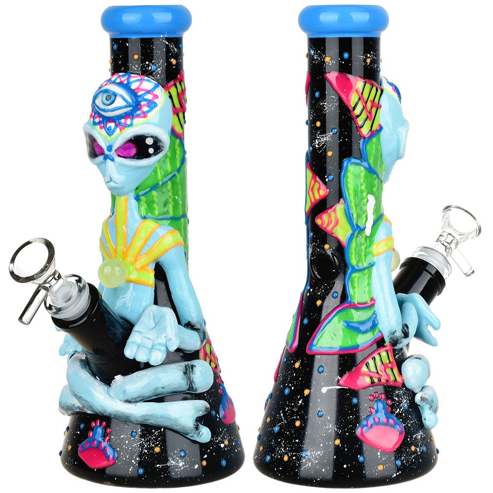 Front view of the Pulsar Artist Series Glow Beaker Water Pipe, featuring a black glass beaker with a glowing, colorful alien design.