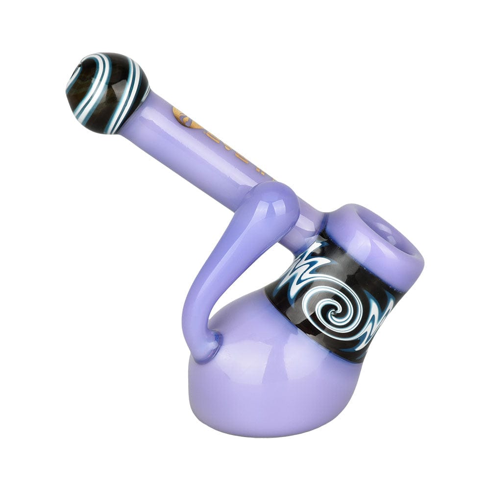 A studio shot of the Hypnotic Haze Bubbler Pipe, displaying its curved glass form and clear construction.