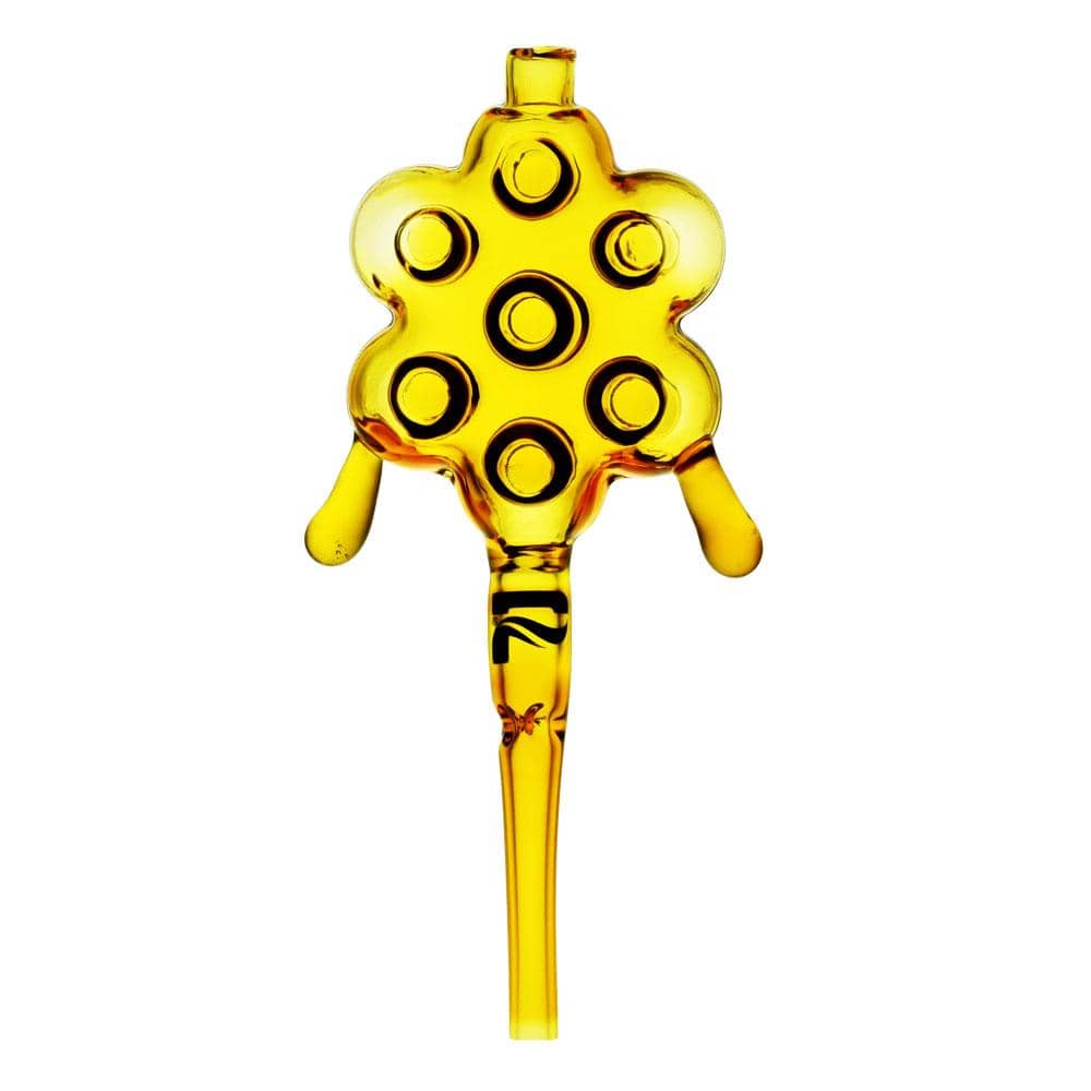 Top-down studio shot of a translucent amber Pulsar 710 Honeycomb Glass Dab Straw showing its honeycomb-shaped head with seven circular hollows and a straight stem.