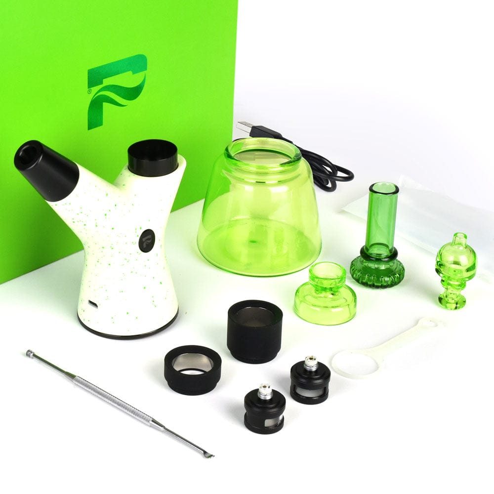A side view of the Pulsar RöK Electric Dab Rig - Luna Glow, with its accessories, against a vibrant green backdrop.