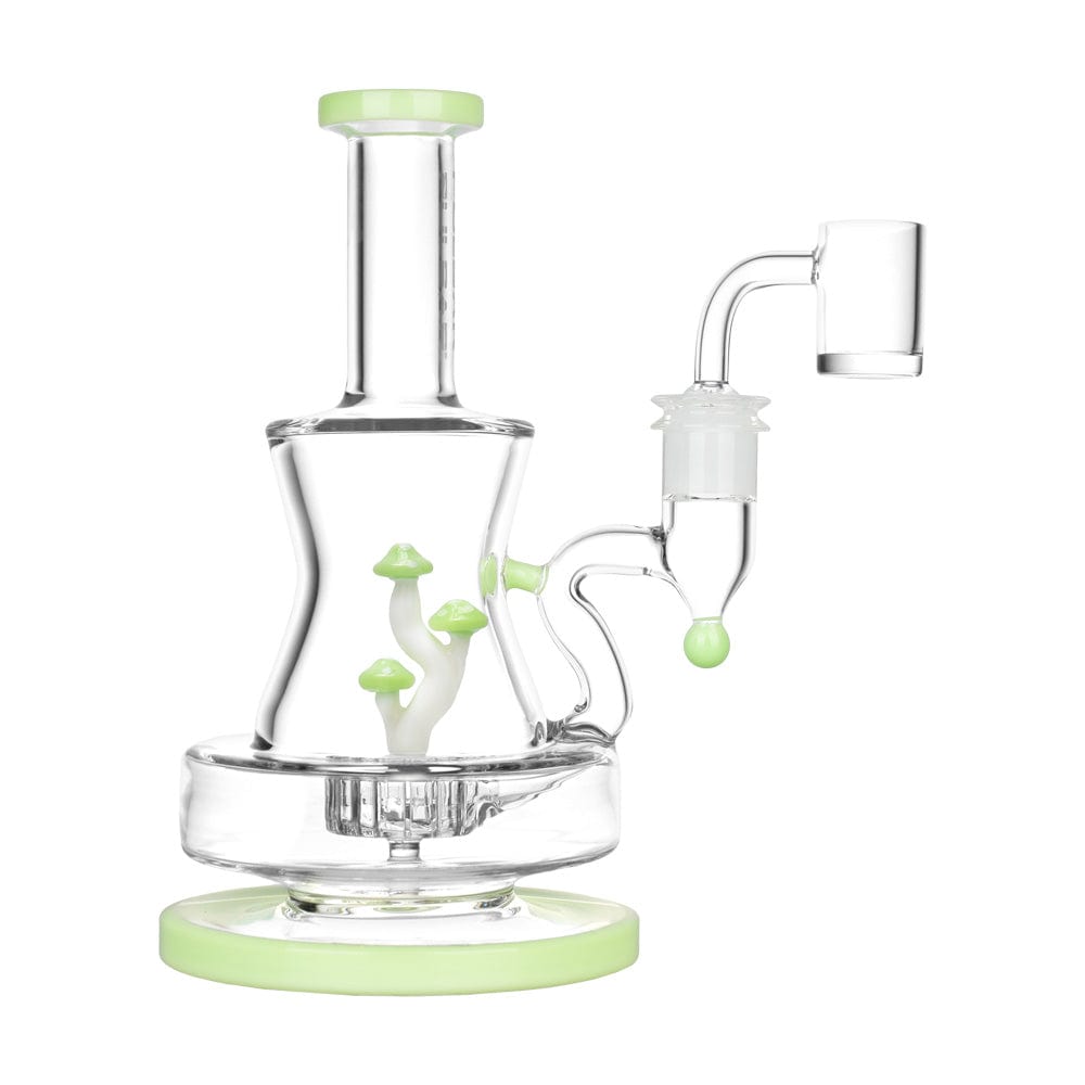 Front view of the Pulsar Shadow Lurking Shrooms Dab Rig, a clear glass rig with mushroom-shaped accents.