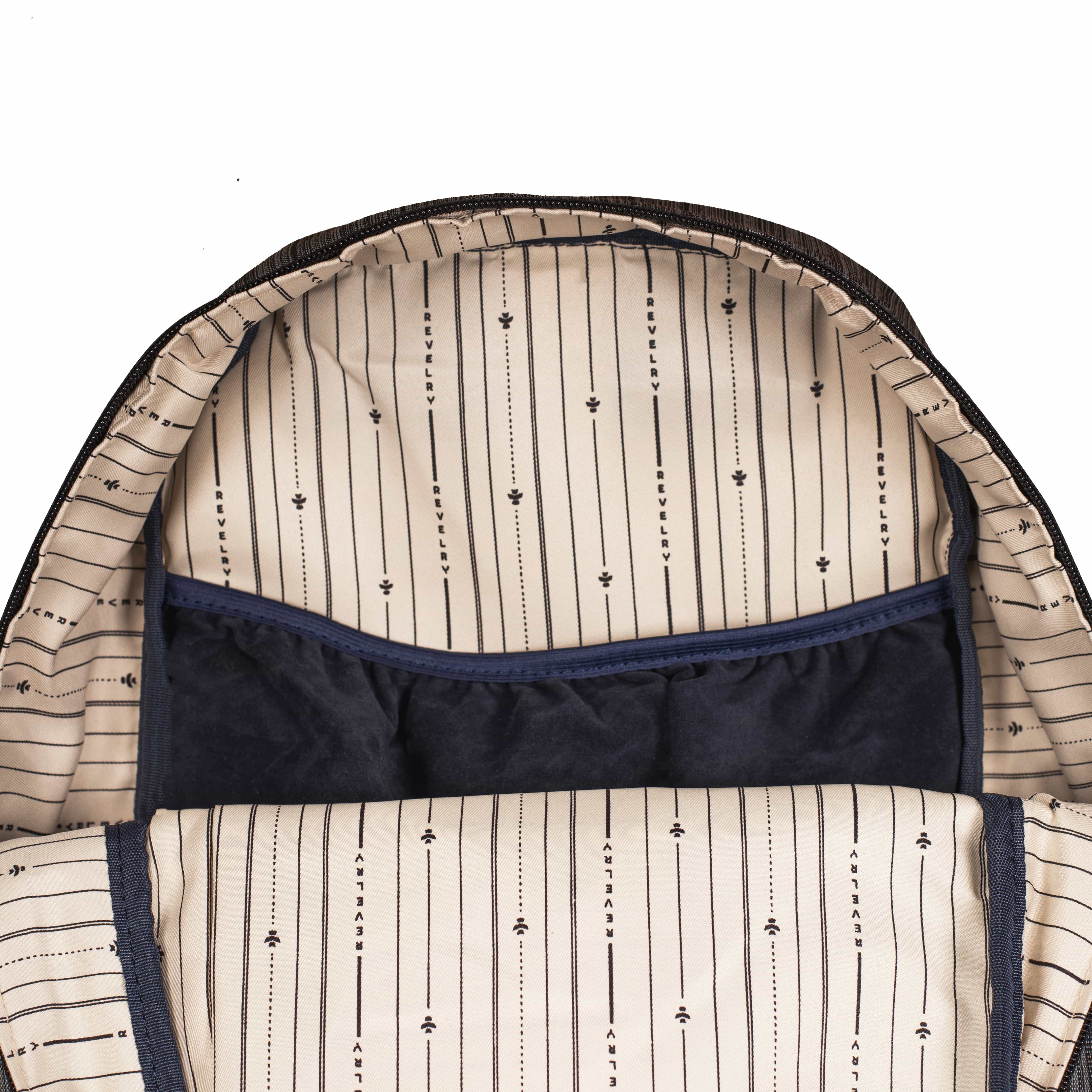 Inside view of The Explorer - Smell Proof Backpack, showing a patterned black and white interior lining.