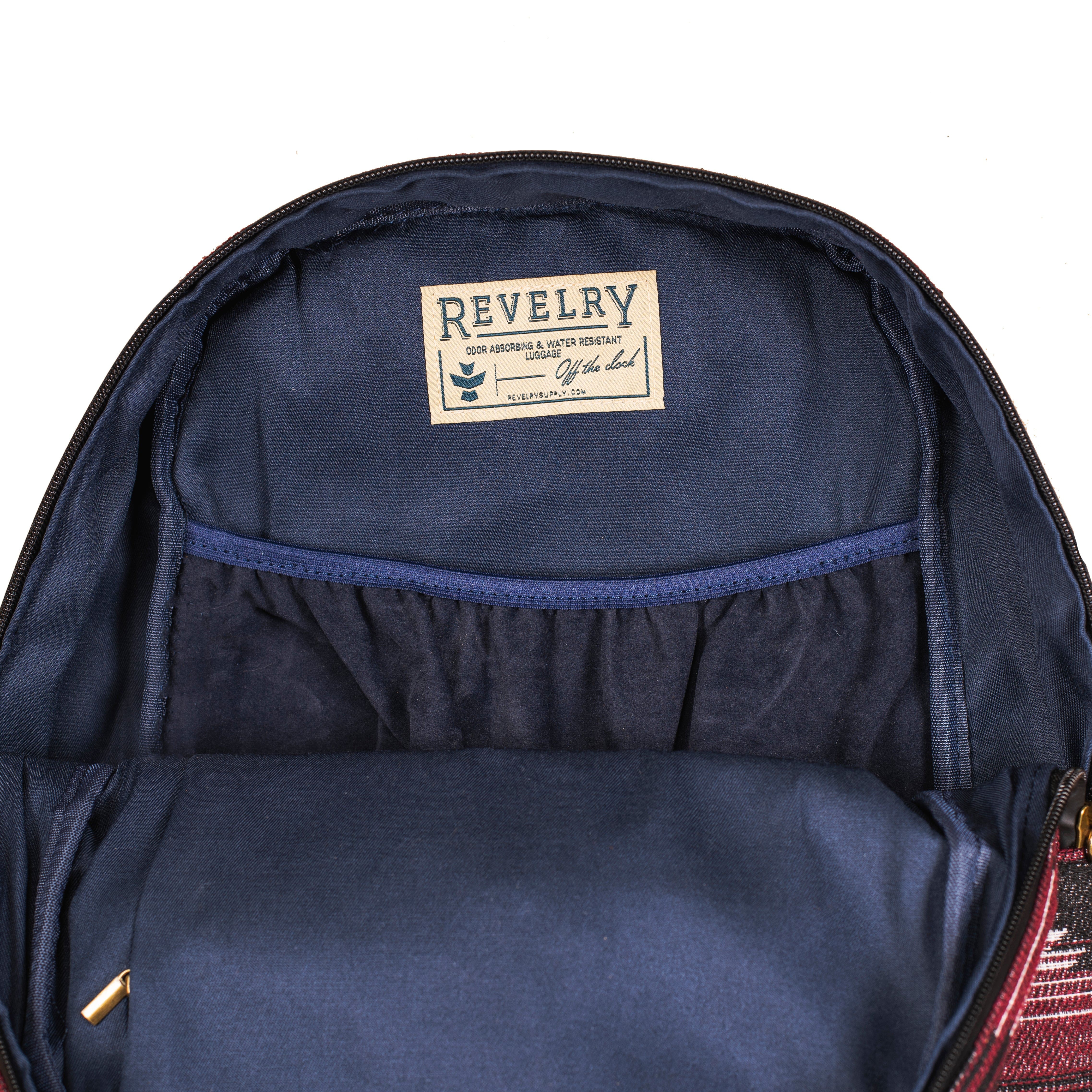 Interior view of The Explorer - Smell Proof Backpack, showing dark gray fabric and zipper detailing.