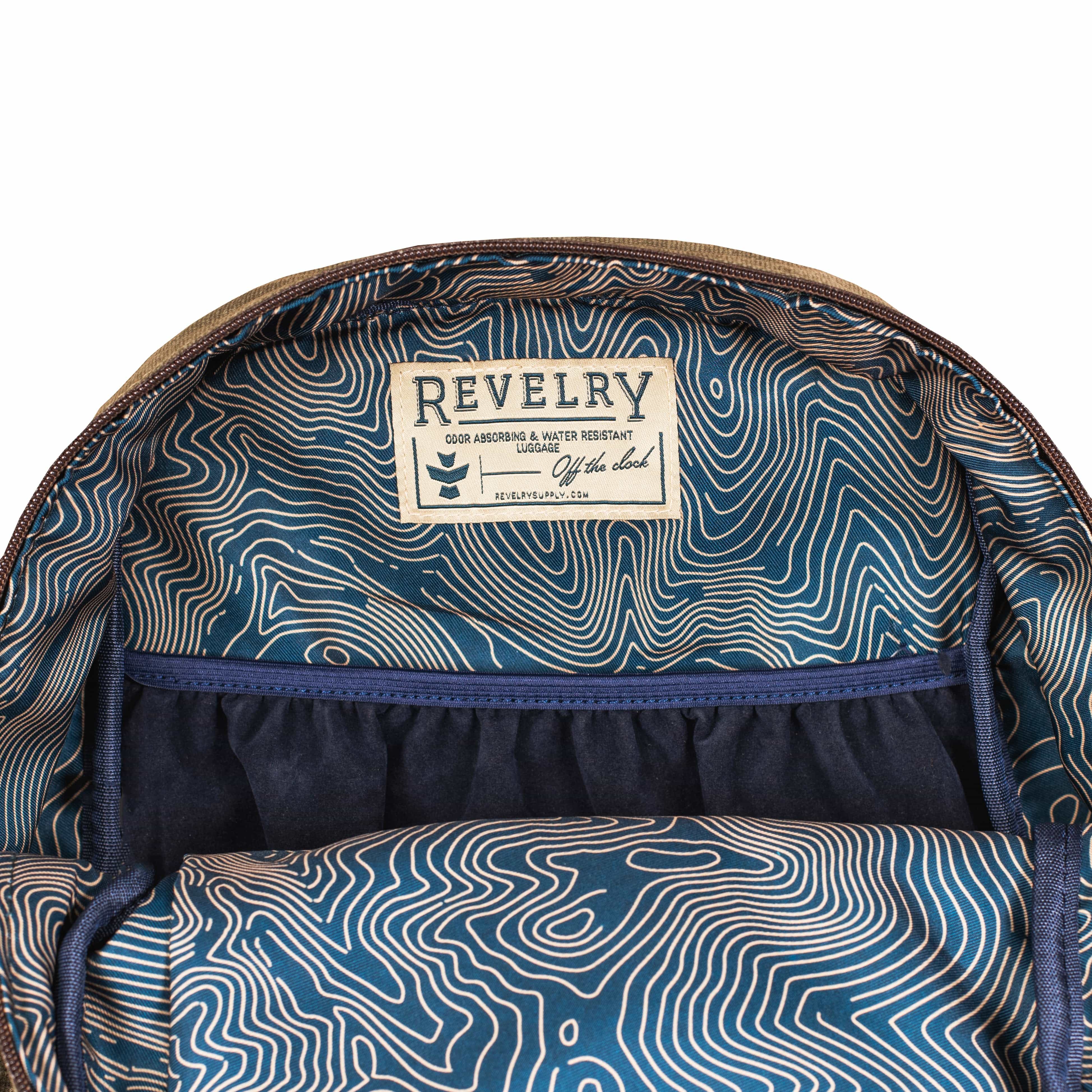 Close-up of the interior lining of The Explorer - Smell Proof Backpack, showcasing a patterned, dark-colored fabric.