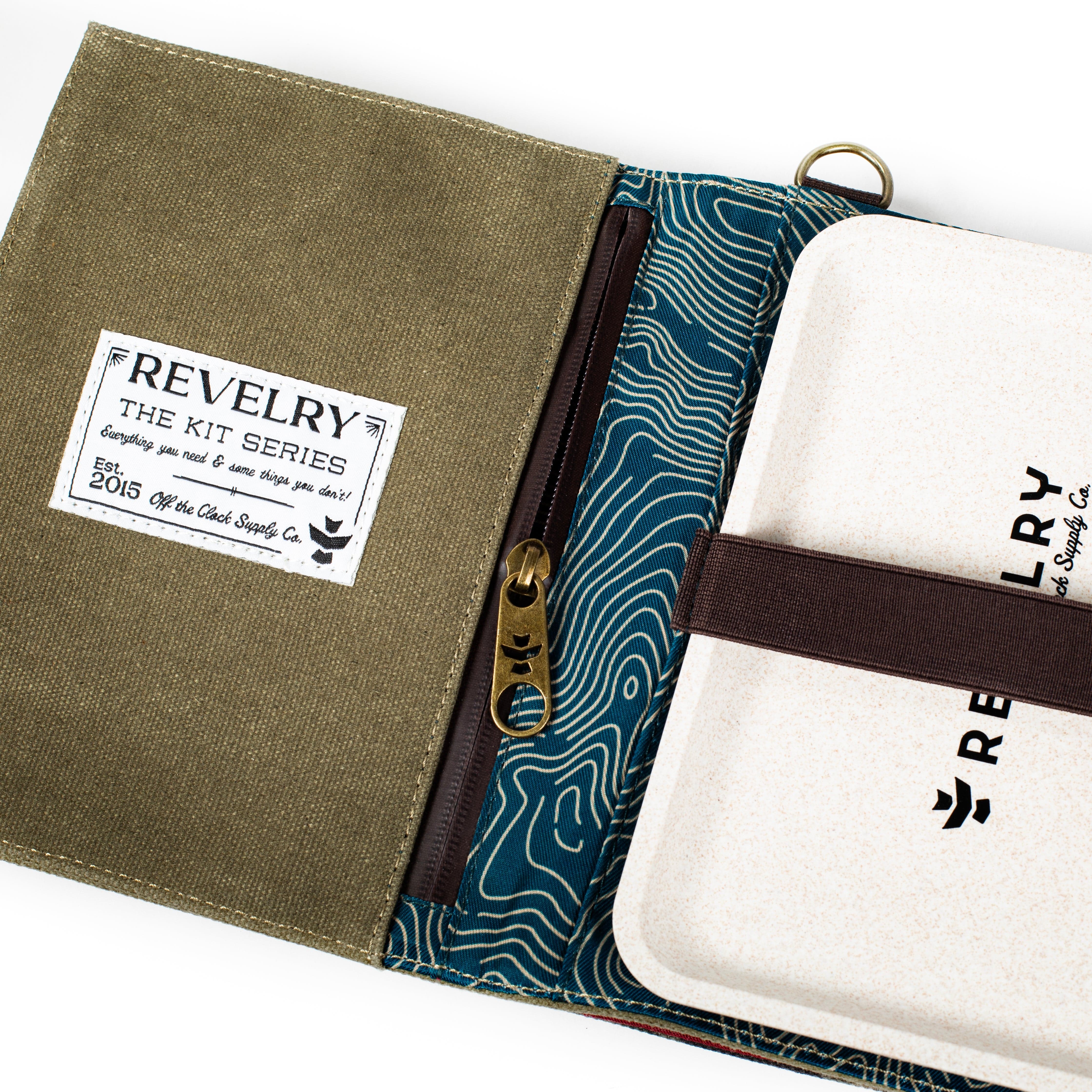 Front view of The Rolling Kit - Smell Proof Kit, showcasing a patterned fabric exterior with branded text.