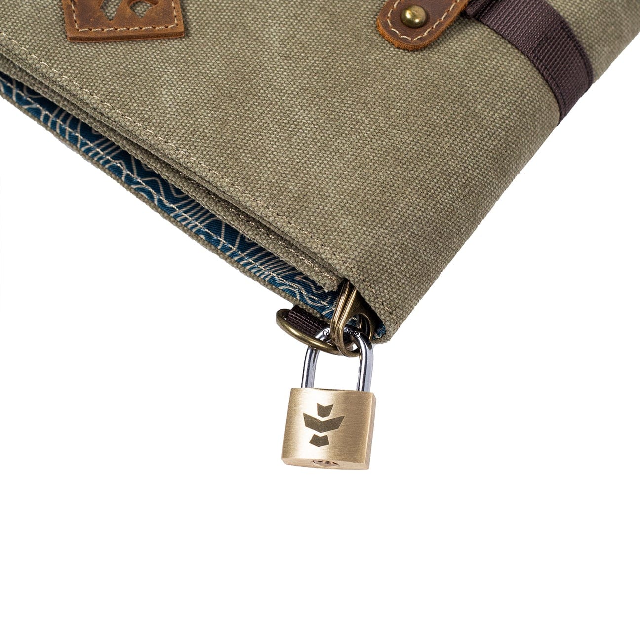 Close-up angled view of The Rolling Kit - Smell Proof Kit, showing the kit’s zipped opening with patterned lining.