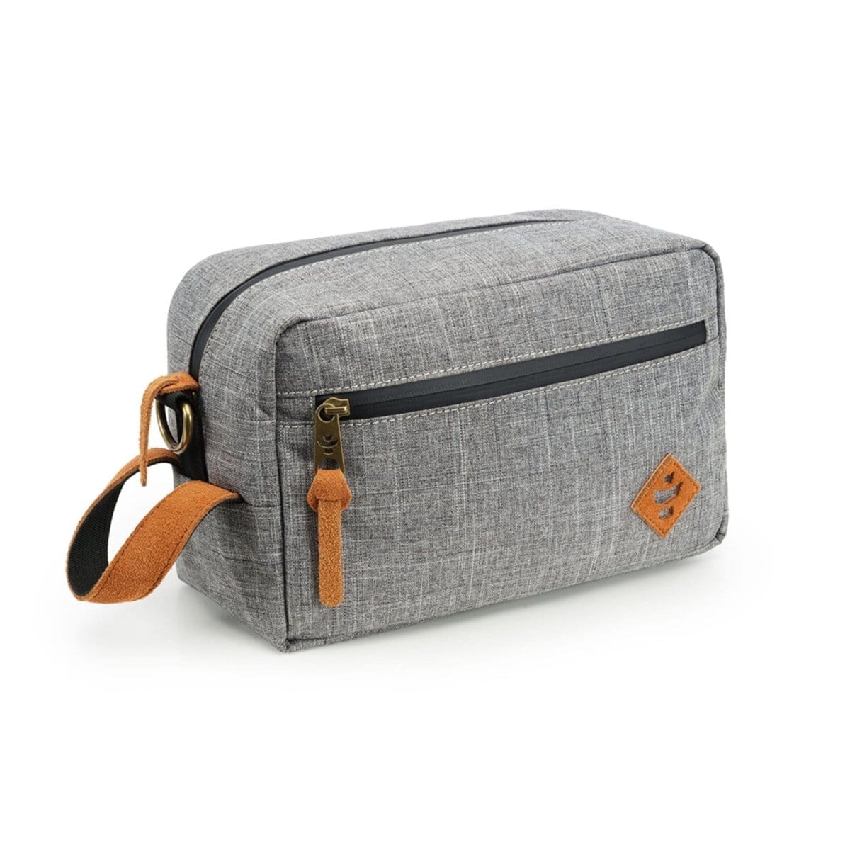 A slightly angled view of The Stowaway - Smell Proof Toiletry Kit, a gray zippered bag with a carry handle.